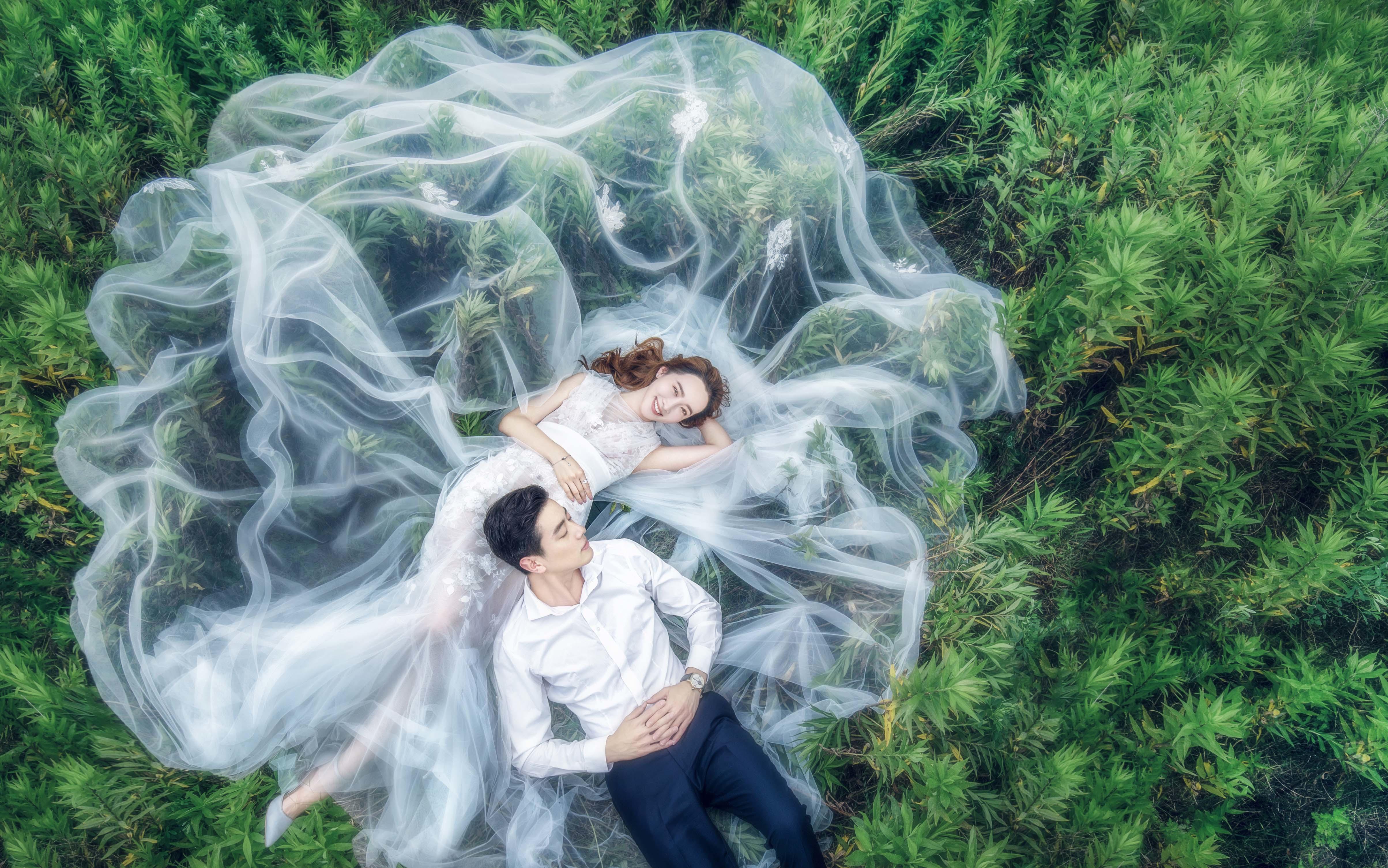 全包夜景+门票+中餐+胸贴+ 车费+全新婚纱