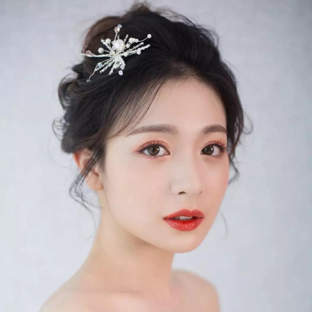 甜美的新娘造型，用柔情等待春暖花开
