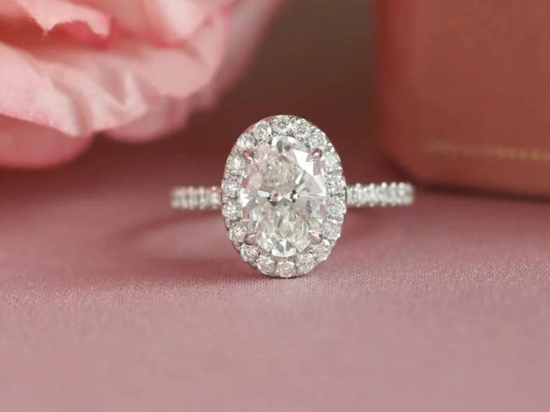 the   one椭圆形围镶钻戒