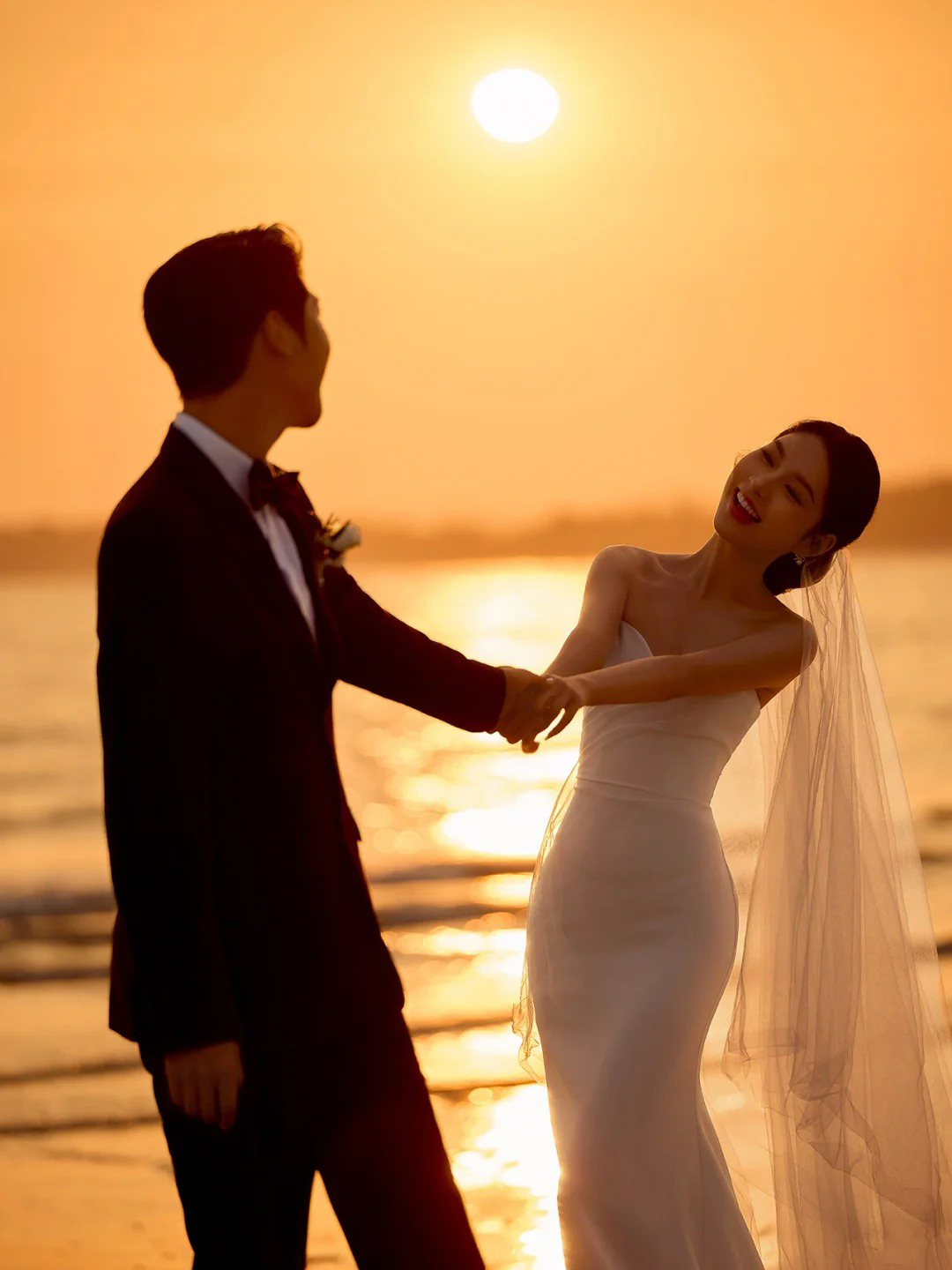 海边夕阳婚纱照