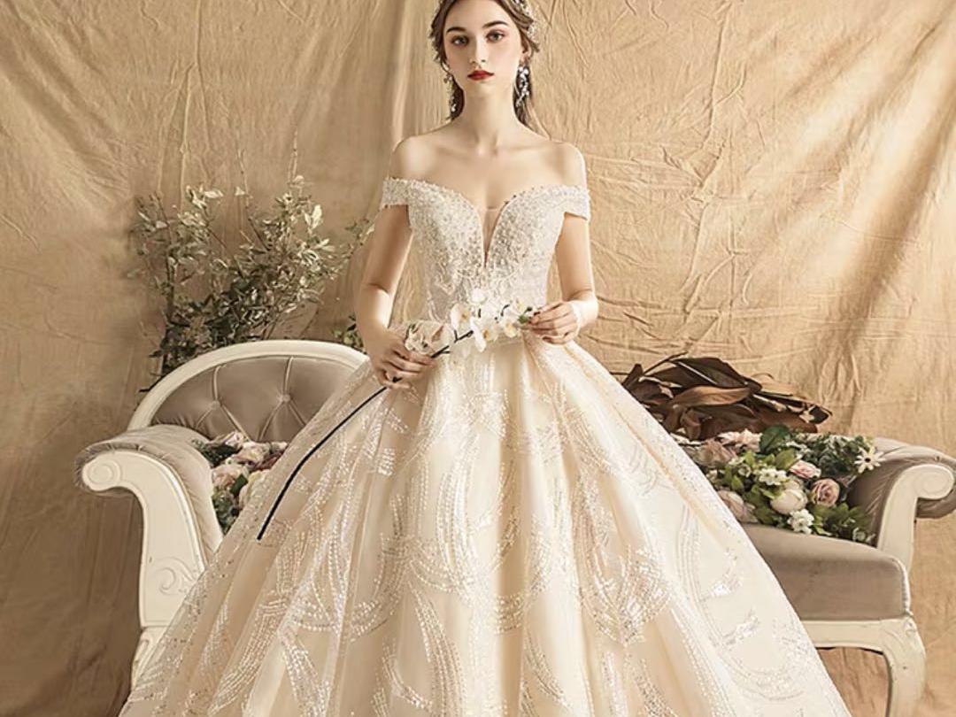 网红快手婚纱礼服2019新款新娘重工拖尾一字肩法