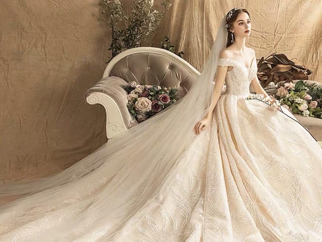 网红快手婚纱礼服2019新款新娘重工拖尾一字肩法