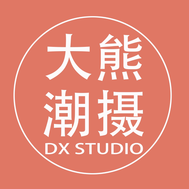 大熊潮摄