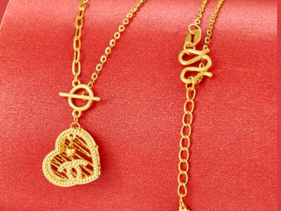黄金镂空心形调节套链 区别于传统黄金首饰的单一 