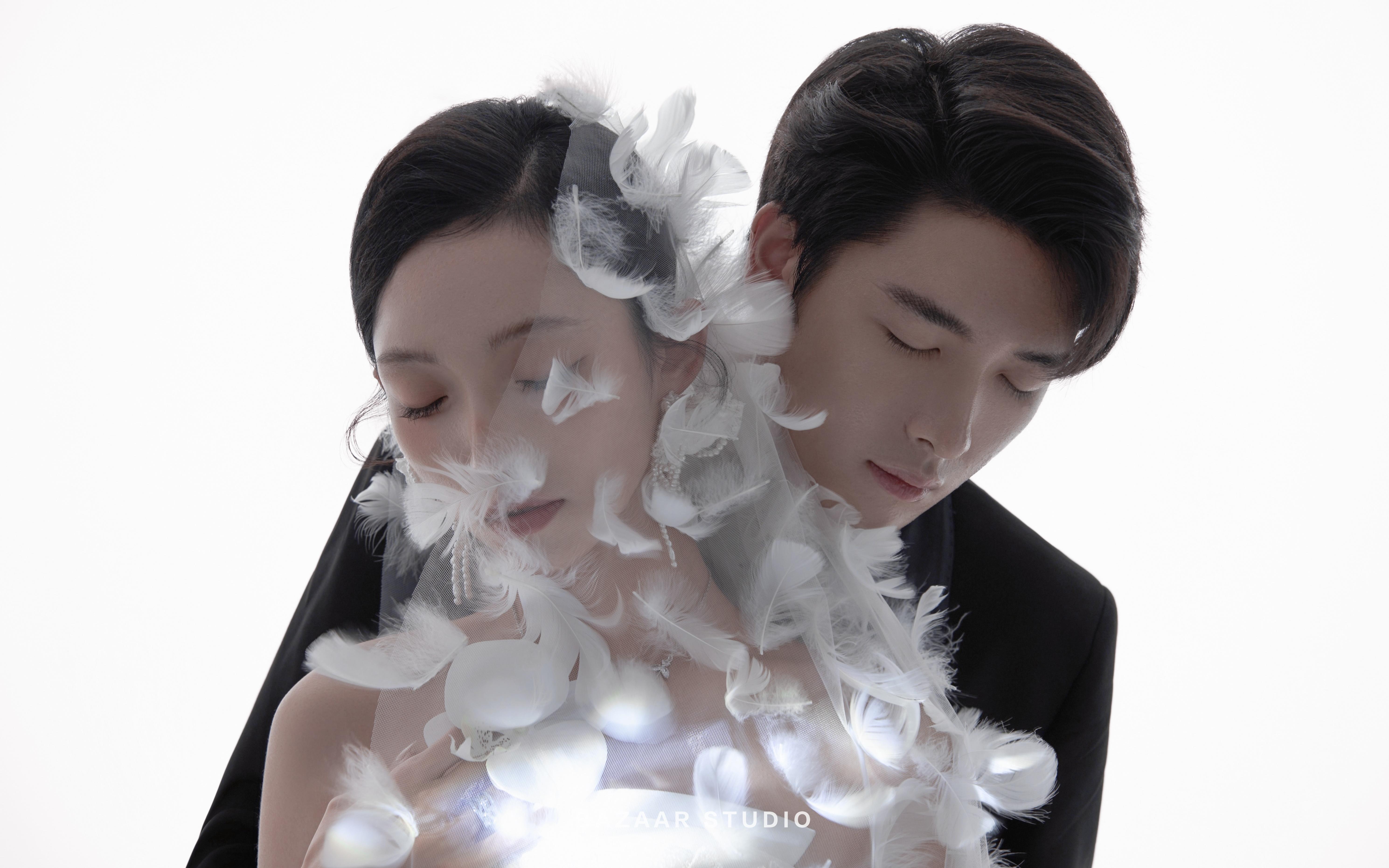 光影里的浪漫 羽毛氛围感主纱婚纱照~
