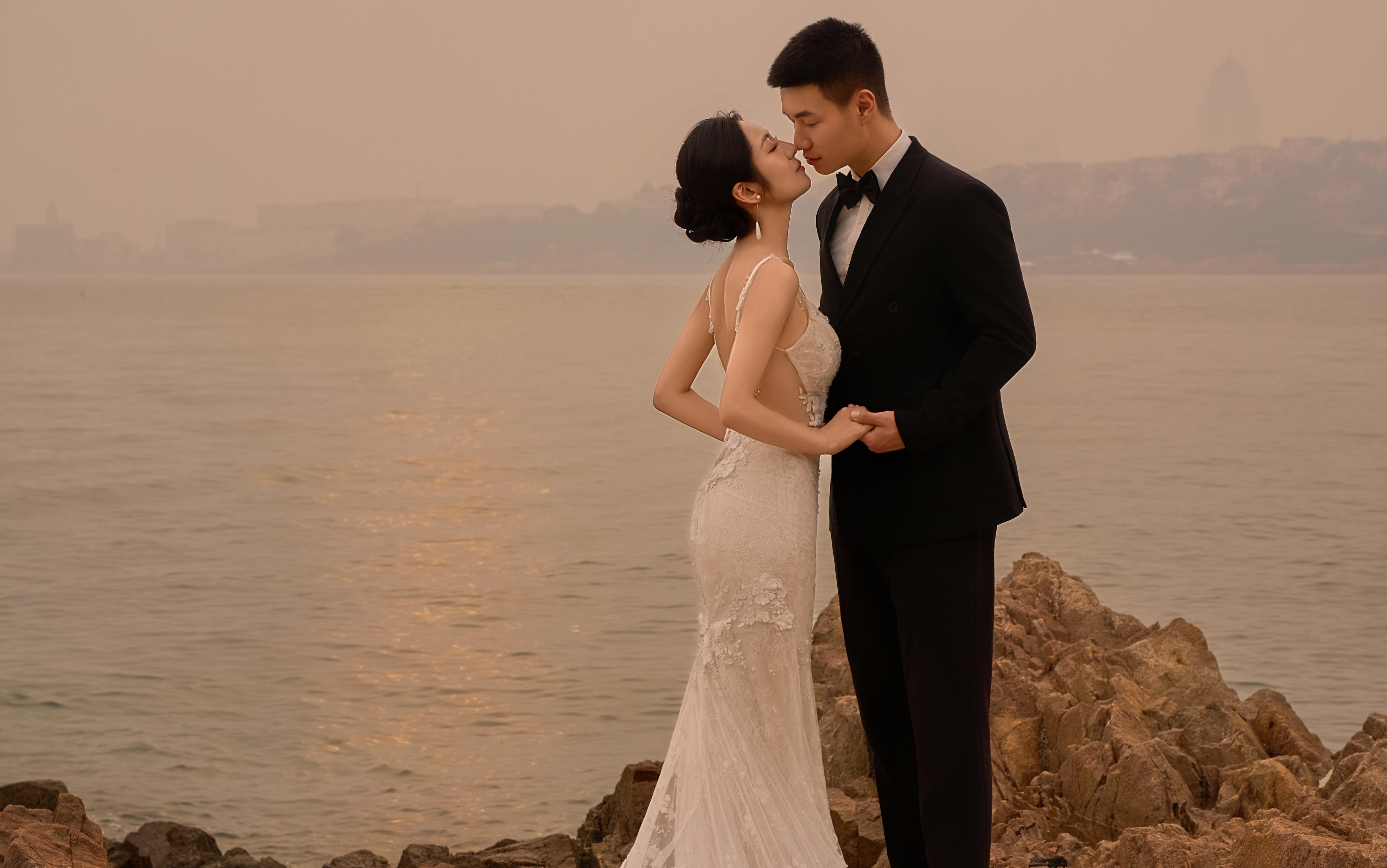 庄萌夫妇/海边夕阳