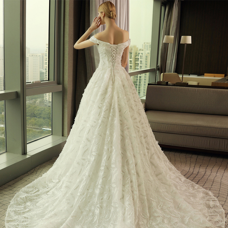 【下单送8件套】一字肩婚纱长拖尾韩式时尚修身羽毛蕾丝婚纱新娘