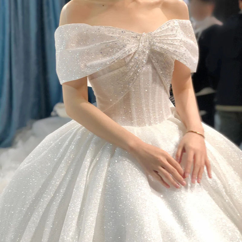 星空主婚紗2022新款新娘氣質復古簡約遮粗手臂顯瘦法式大拖尾婚紗